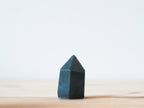 Handcrafted porcelain crystal sculpture, unique sculptural decorative piece with textured surface, subtle tints, and natural variations.