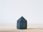 Handcrafted porcelain crystal sculpture, unique sculptural decorative piece with textured surface, subtle tints, and natural variations.