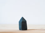 Handcrafted porcelain crystal sculpture, unique sculptural decorative piece with textured surface, subtle tints, and natural variations.