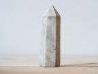Handcrafted porcelain crystal sculpture, unique sculptural decorative piece with textured surface, subtle tints, and natural variations.