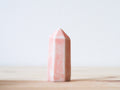 Handcrafted porcelain crystal sculpture, unique sculptural decorative piece with textured surface, subtle tints, and natural variations.