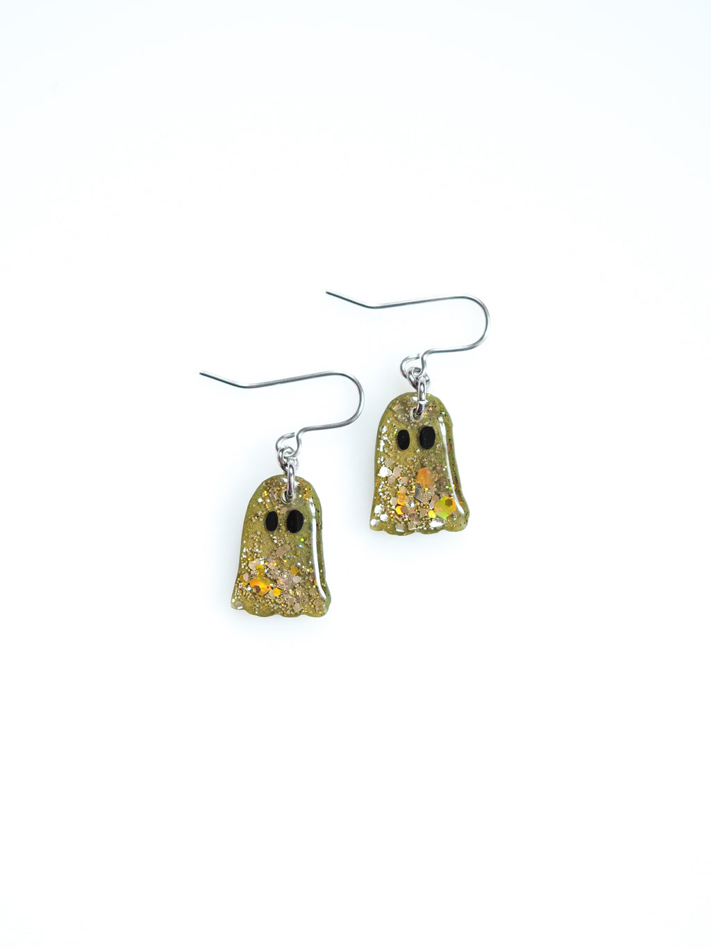 Melinoë ghost drop earrings in autumn green with holographic colour shifting glitter on a white background