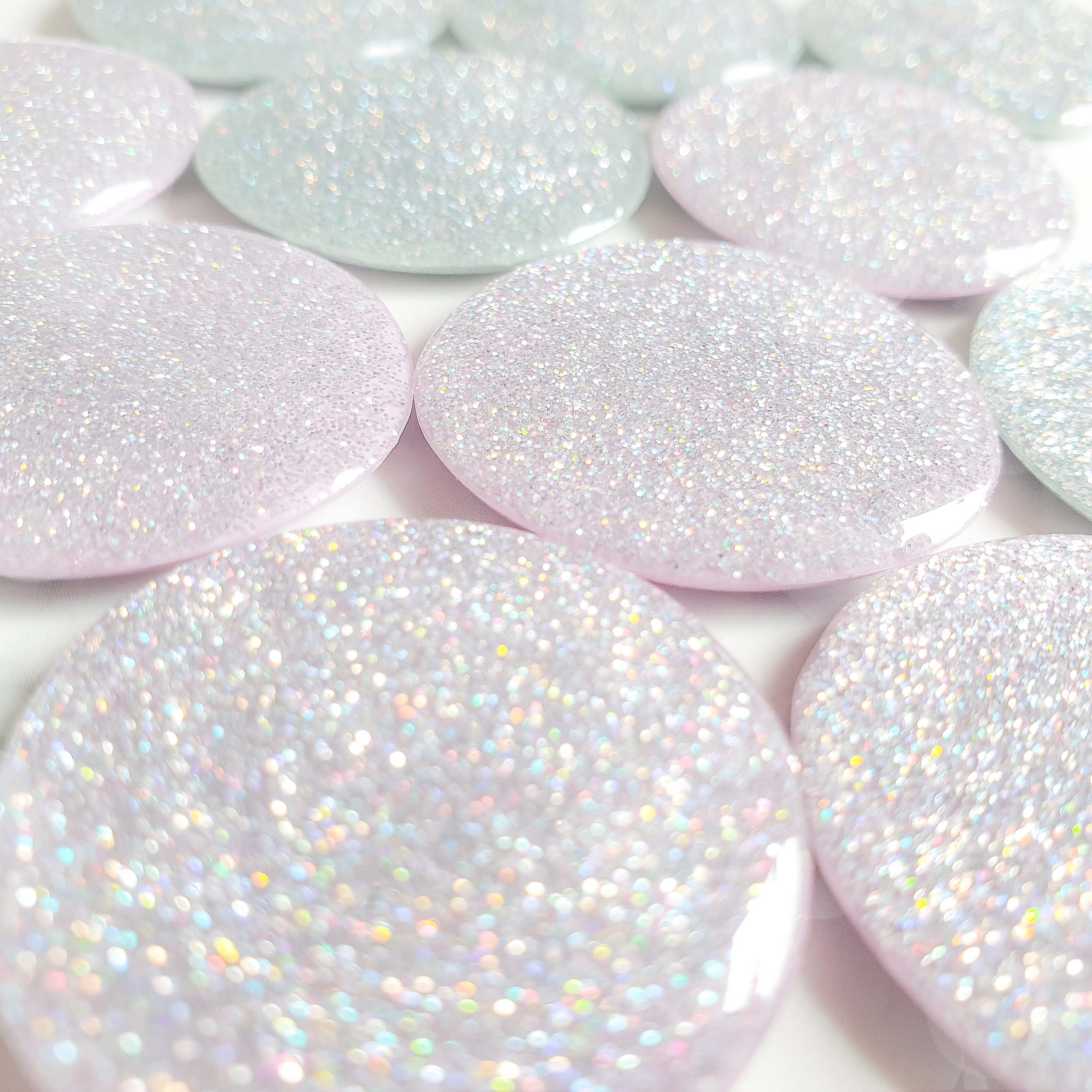 Terra Nova earring components in soft pastel colours with holographic glitter by Micky made it