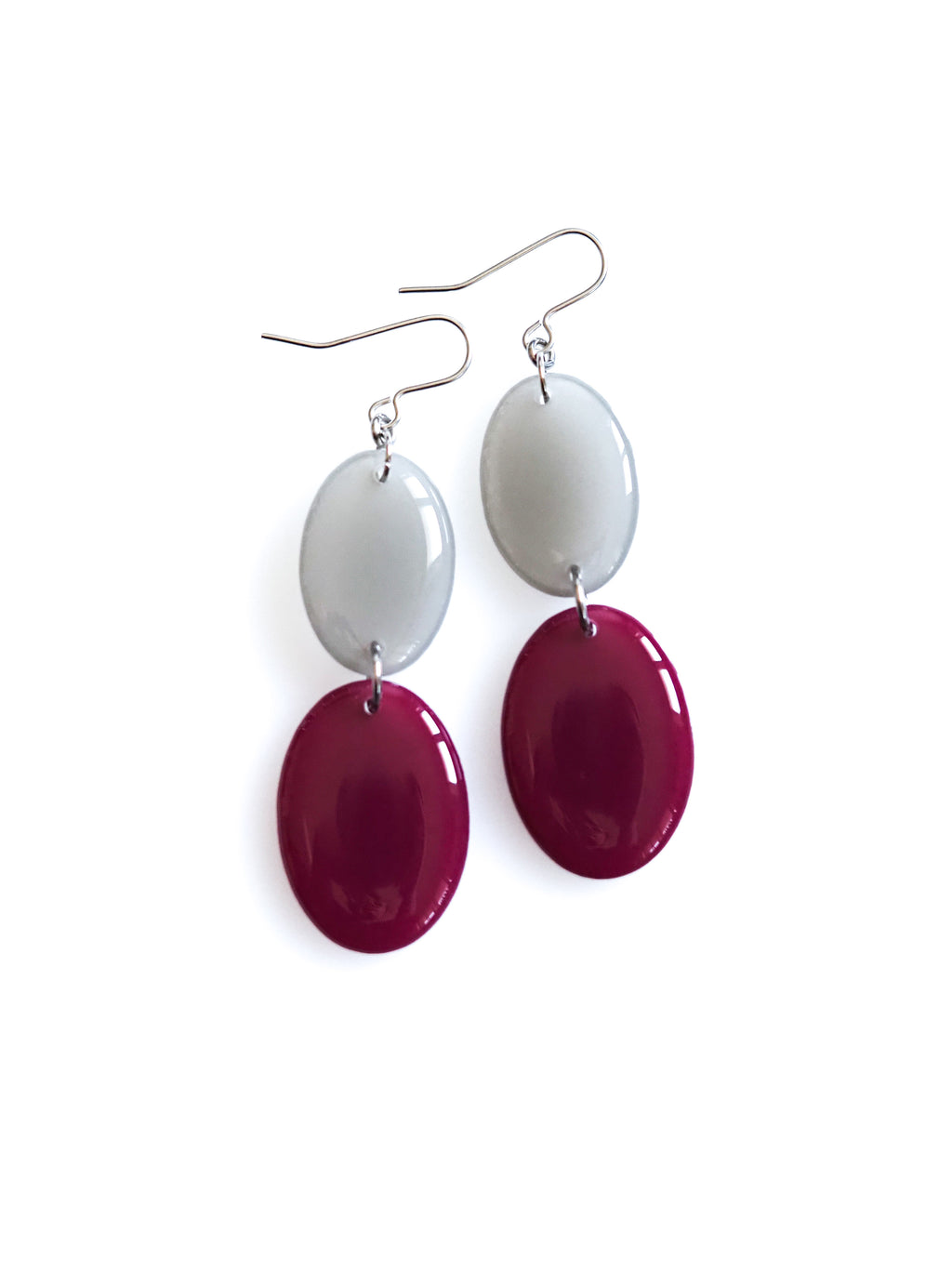 Duet resin drop earrings from the Chroma collection in mist grey and mulberry on a white background