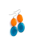 Duet resin drop earrings from the Chroma collection in orange and transparent ink blue on a white background