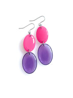 Duet resin drop earrings from the Chroma collection in candy pink and transparent aubergine on a white background