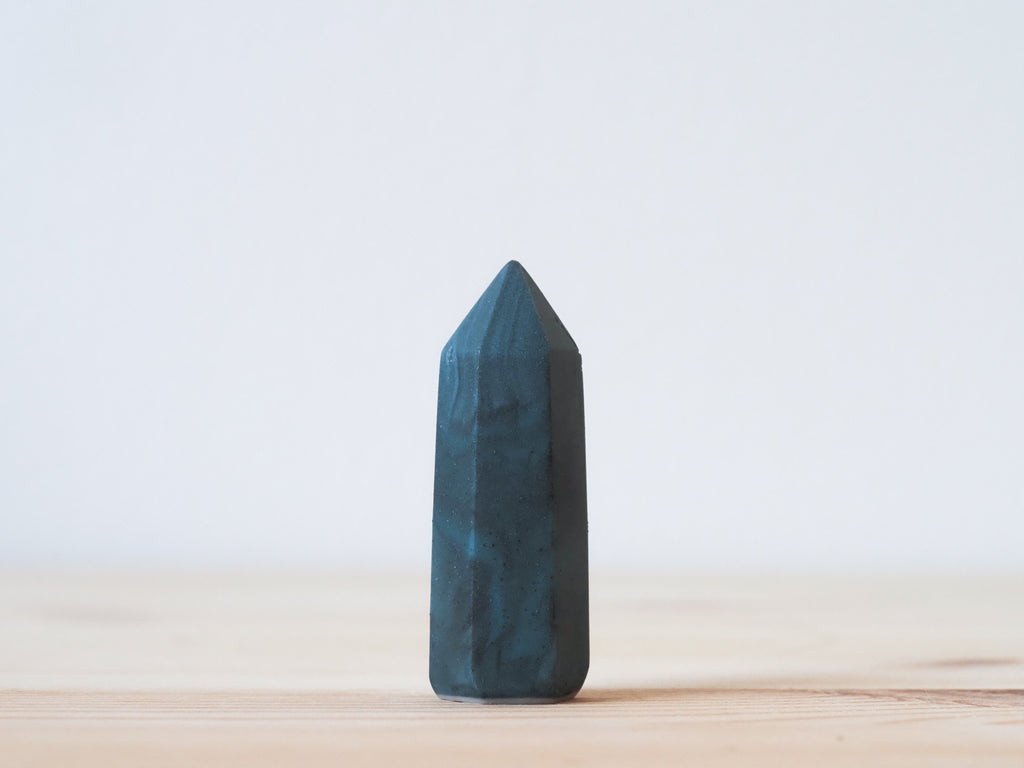 Handcrafted porcelain crystal sculpture, unique sculptural decorative piece with textured surface, subtle tints, and natural variations.
