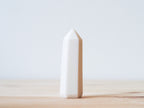 Handcrafted porcelain crystal sculpture, unique sculptural decorative piece with textured surface, subtle tints, and natural variations.